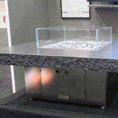 Honed Black pearl with chiseled edge, brushed stainless base