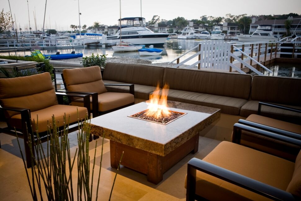 Copper fire pit table with granite top by Cooke Furniture